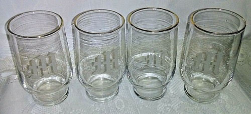 Etched drinking glass with - etched,