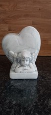 Joli vase à décor d'un ange mesurant 19 cm X 15 cmX 11,5 cm TBE