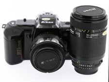 Nikon F-401 + NIKON AF 35-70 mm 3.3-4.5 + Nikon af 70-210 macro + Nikon SB22