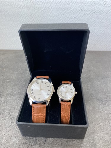 Coffret montres une - une, et