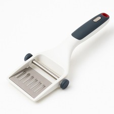 Coupe‑tranches à fromage