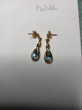 paire de Boucles d'oreilles plaqué or imitation pierre bleue