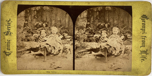 Fillettes dans une brouette