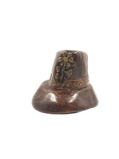 Sculpture forme à Chapeau