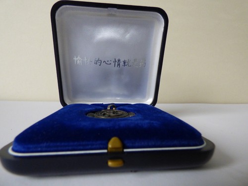 Pendentif dragon croix pattée