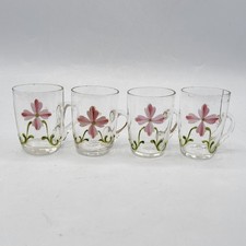 Série quatre verres à liqueur verre soufflé émaillé à décor floral début XXème 