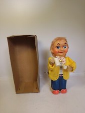 ANCIEN JOUET AUTOMATE EN FER ET CAHOUTCHOU MADE IN JAPAN