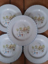 5 Assiettes plates en Faïence