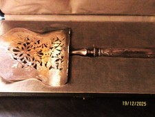 PELLE A ASPERGES METAL ARGENTE