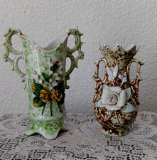 DEUX VASES anses ajourées