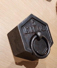 Ancien poids hexagonal en fonte pour balance 5 KILO G