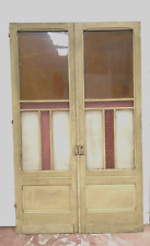 ensemble de deux portes de séparation à carreaux de couleurs . XX siècle .