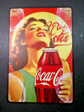 Plaque publicitaire en tôle