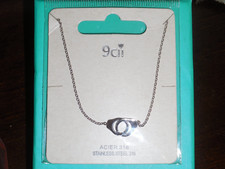 Collier menotte et chaine fine