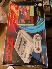 pack de la console Super Nintendo Entertainment System (SNES) avec le jeu...