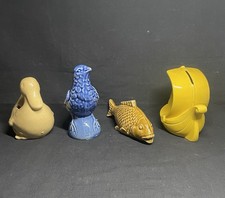 Lot de 4 anciennes tirelires