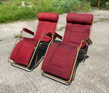 2 transats chaises longue en bon état .