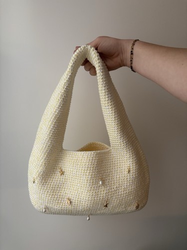 Sac main - à,