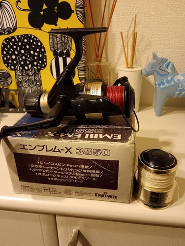 Daiwa spinning reel emblem - reel,