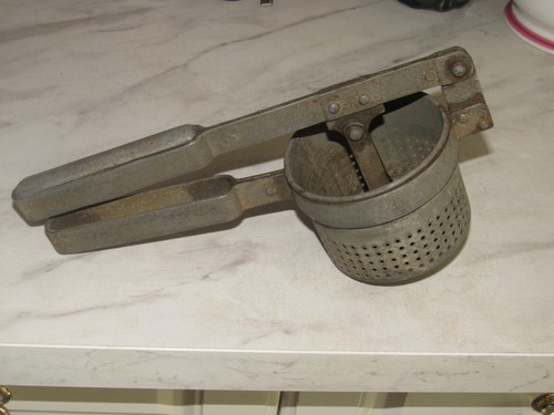 Ancien presse purée - ,