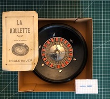 Ancienne Roulette de Comptoir, Au Nain Bleu🃏, en Bakélite avec Boîte et Notice