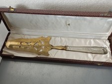 pelle à tarte métal argenté