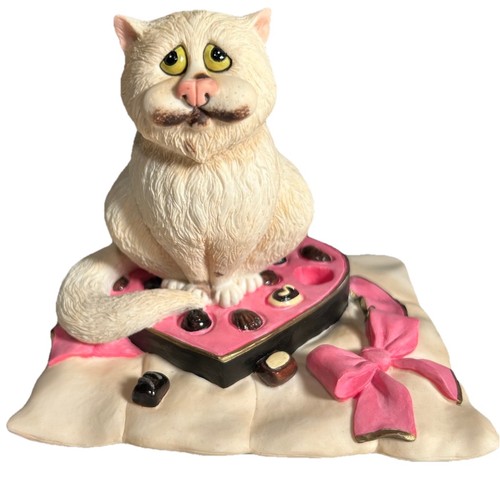 Comics curious cat figurine - &,