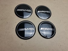 Lot de 4 Stickers AMG Abs 65mm –  Noir Enjoliveurs 