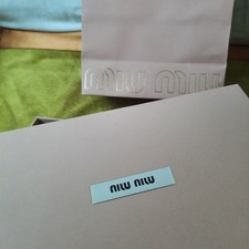 Boite MIU MIU un peu déchiré