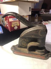 Antique Cast Iron Sunday