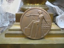 Médaille bronze art deco augis  par masson 6.3cm