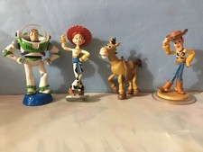 4 PETITES FIGURINES TOY STORY DISNEY : BUZZ, JESSY , WOODY , PILE POIL -  NEUF