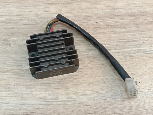 Régulateur tension charge - un,