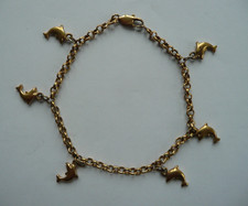 BRACELET en Plaqué Or (poinçon) avec Breloques de DAUPHINS