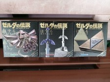 The Legend of Zelda Huzzle Set Master Sword Triforce Crest of Hyrule Neuf