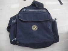...sac kipling  bleu foncé + un sac a dos abimée en cadeau