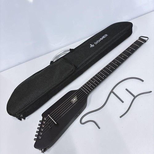 Guitare voyage donner - de,