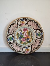 Grand plat en faïence signé H BEQUET décor de poisson