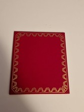 CARTIER PORTE CARTES DOCUMENTS BLOC NOTE. CUIR ?? ROUGE ET OR BAGAGE