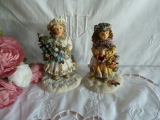 2 figurines Noel enfant sapin