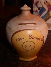 Ancienne tirelire à casser en