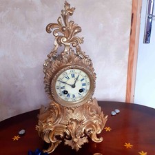 Cartel rocaille de style Louis XV en bronze doré