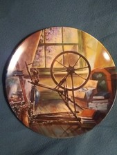THE ANTIQUE SPINNING WHEEL