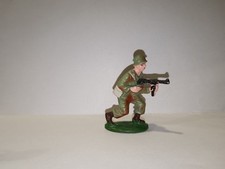 QUIRALU (plastique) militaire chargeant mitraillette