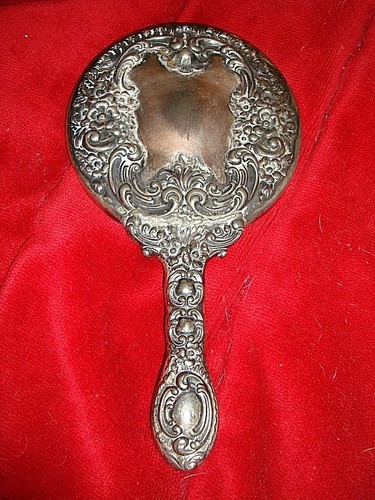 Glace ancienne face main - ancienne, a