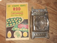 Ancien coupe-oeuf en métal -