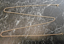 Chaine maille gourmette  en or  18 K  poincon  tete d aigle