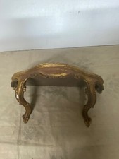 Console murale dorée style baroque 1 pieds à été recollé 1 éclat au fond à resta