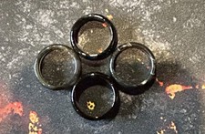 QUATRE ANNEAUX VINTAGE NOIRS T56 Et 57 