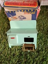 cuisinière ancienne poupée